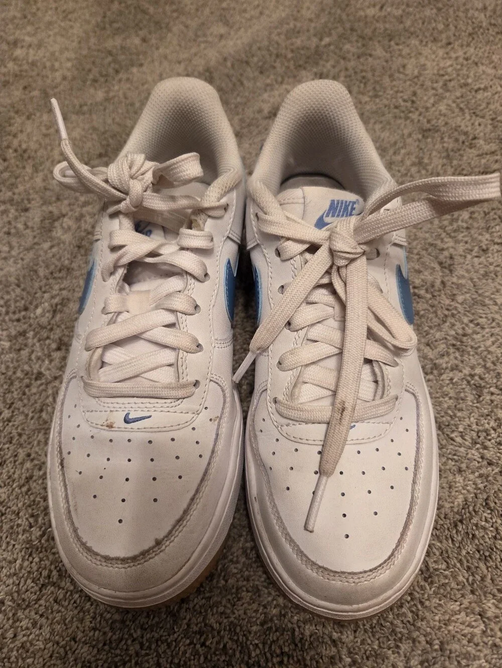 Nike Kids White Sneakers with Blue Swoosh